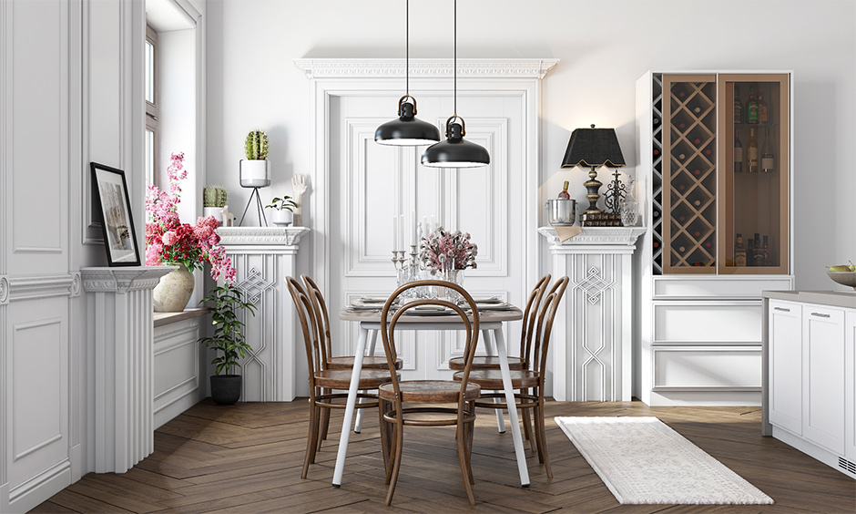 DIY valentine's day decorations, the white dining room decorated with flowers and candles on the dining table.