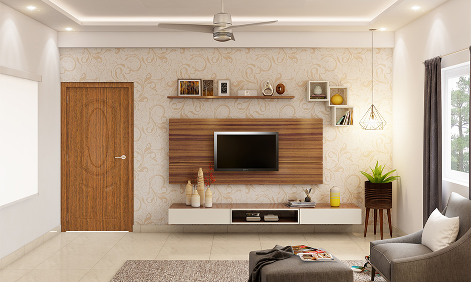 The hanging pendant light in geometric shape next to the tv unit looks fancy, ceiling hanging lights for the living room.