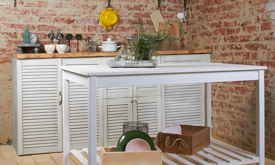 Metal kitchen cart on wheels like a dining table where you can have a quick meal