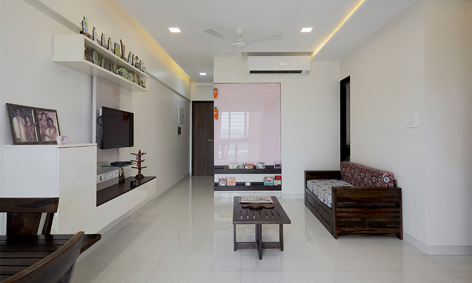 Mumbai 2 bhk's white living room is designed by designcafe interior designers