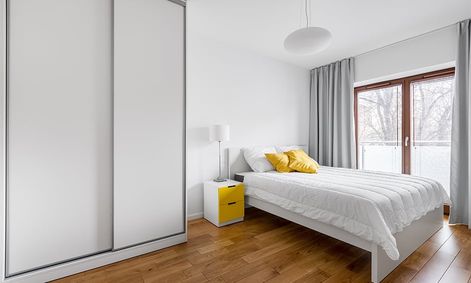 Modern and minimal white bedroom cupboards