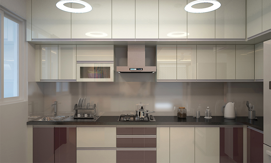 L-shaped modern kitchen wall tiles designed in a metallic glossy finish backsplash looks clean and straightforward.