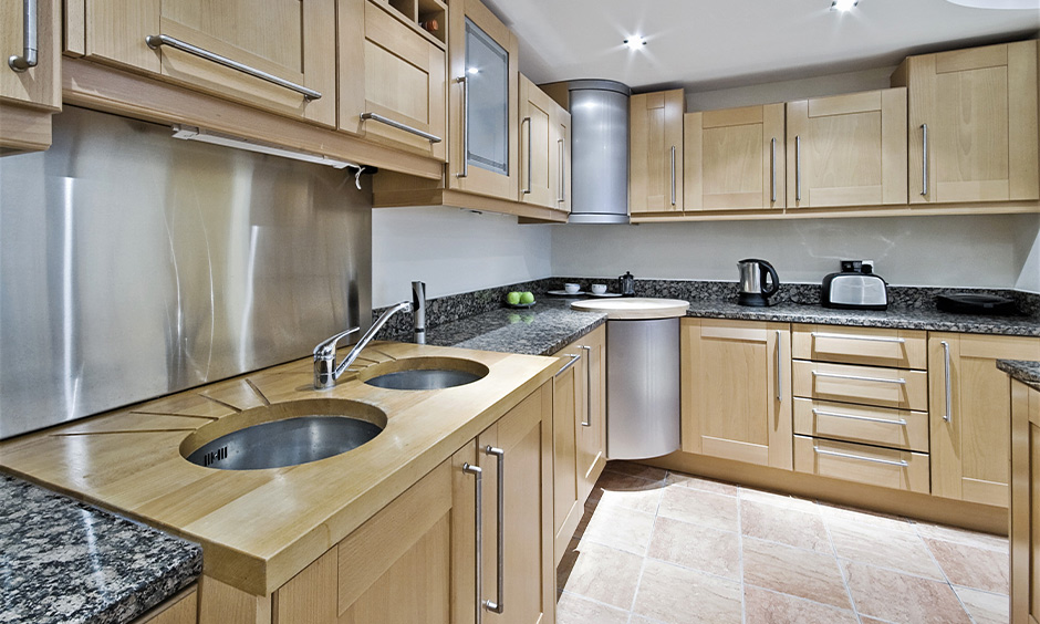 Double bowl kitchen sink in oval-shaped matt finish appealing to the eye