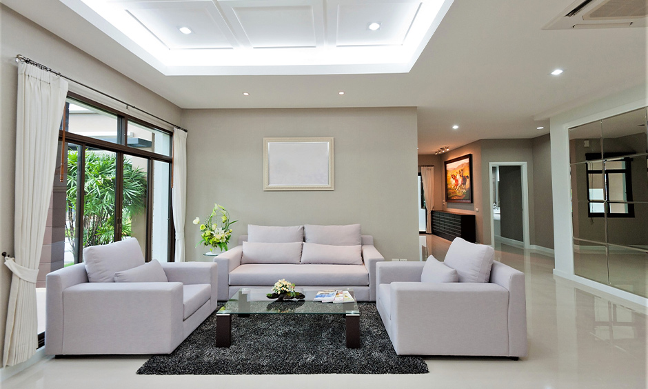 White pop ceiling design for the drawing room fitted with cove lights