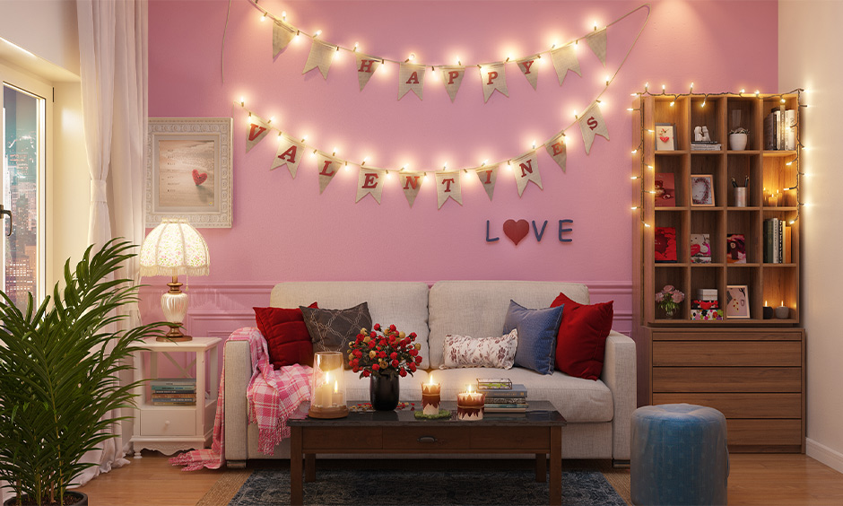 DIY room decorated with candles and fairy lights on the wall and bookshelves is the best room decoration for valentine.