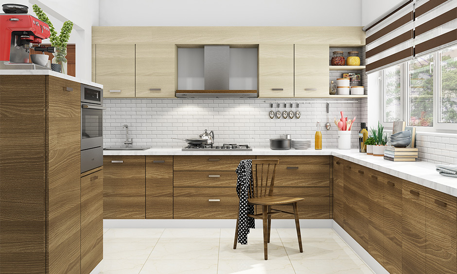 Modern all-white kitchen wall tiles in a brick pattern look simple but sophisticated.