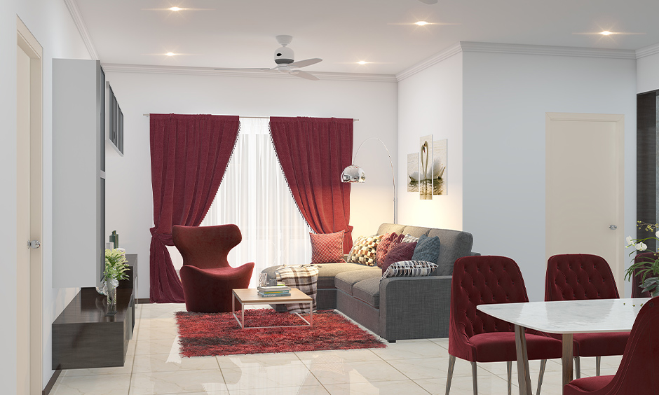 Living cum dining area in cherry red and grey is latest colour combination for home