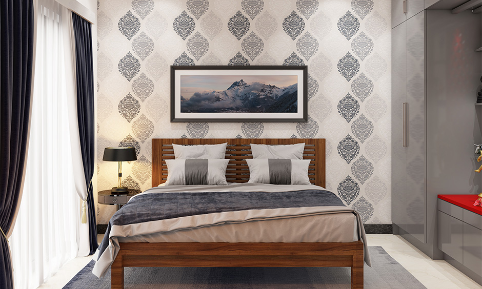 Wooden headboard designs with horizontal line designs against a wallpaper wall looks elegant.