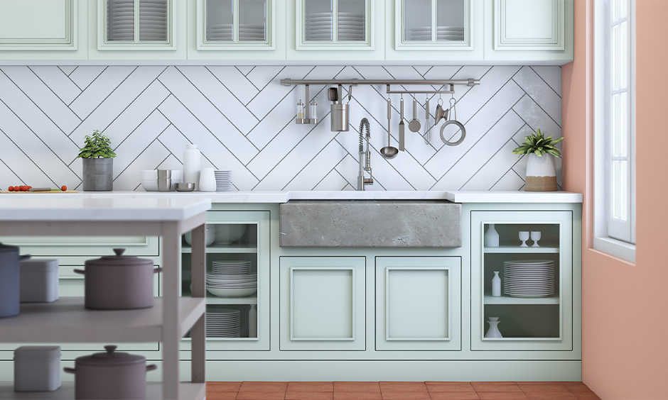 Large rectangular grey marble kitchen sink color and cabinet below in mint green look sleek and classic.