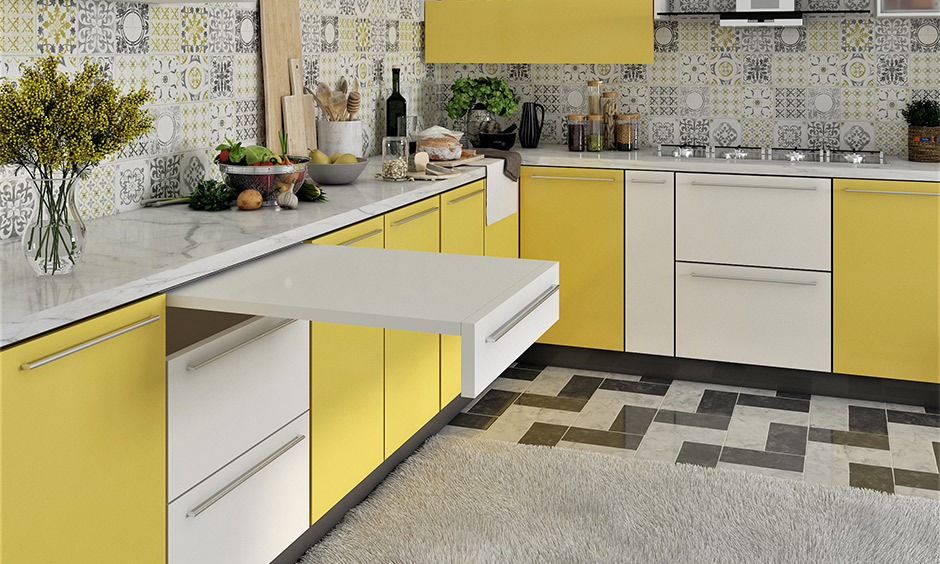 Light yellow two tone kitchen cabinets make a natural and pleasant pair in this kitchen