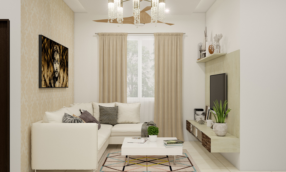 Small living room in beige and white matching colour schemes home with a white fabric lounger couch look aesthetic.