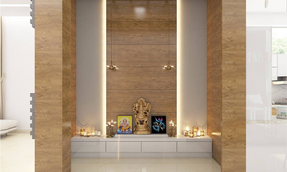 Pooja room Vastu for north facing house, pooja room in a simple design with backlighting behind the wood frame.