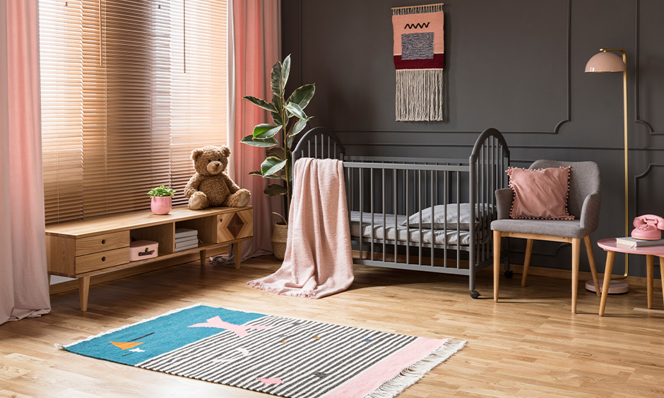 Room decoration for new born baby with wooden flooring and soft rugs