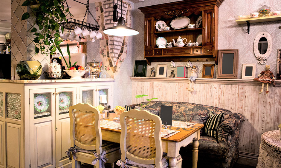 Small dining room in french style interior with delicate and feminine visual elements looks elegant.