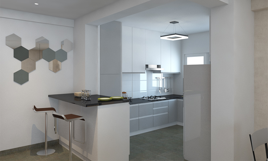 All-white small open kitchen design Indian style with breakfast counter looks modern.