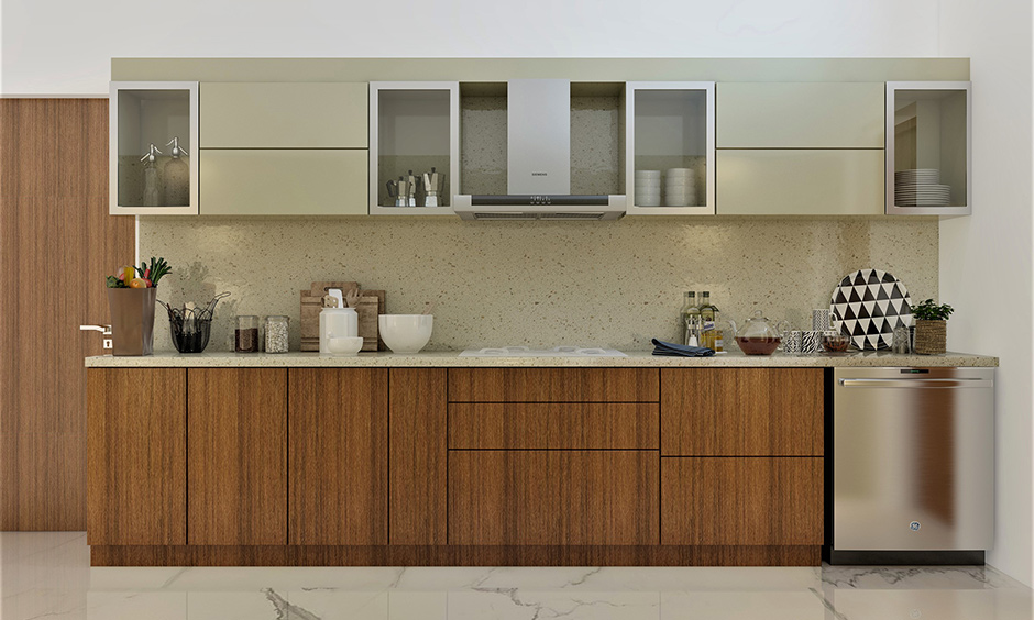 Stainless steel kitchen cabinets online with glass doors which softens the extra shine of stainless steel