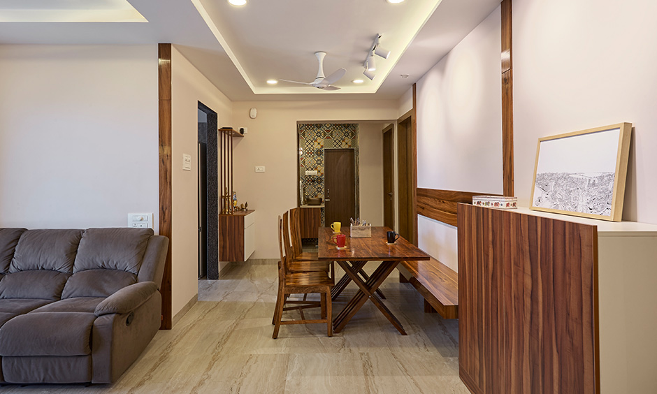 The earthy dining area by best interior designer in navi mumbai