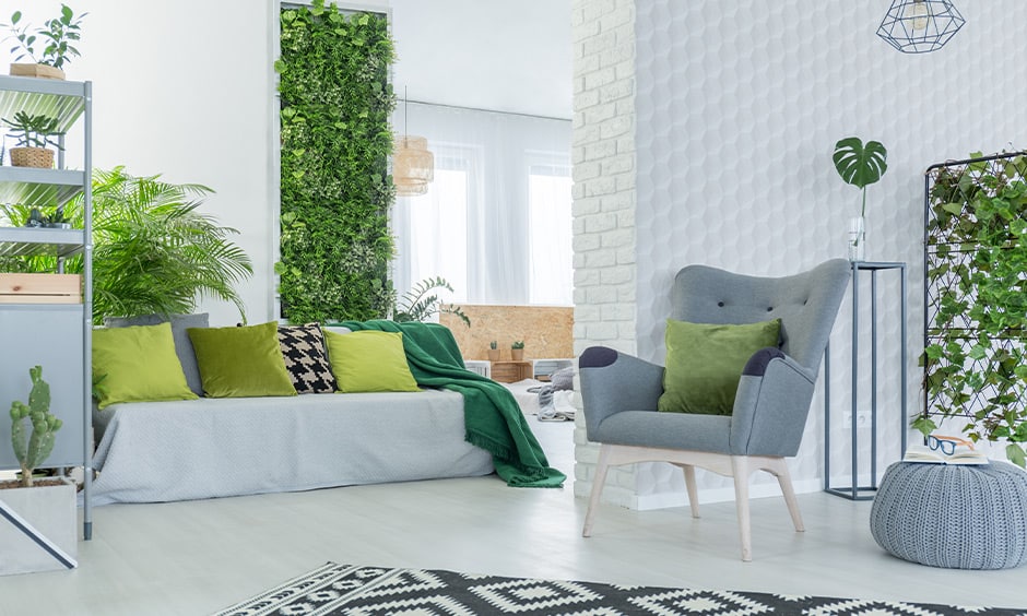 Living room indoor plant wall transforms the place into an urban jungle