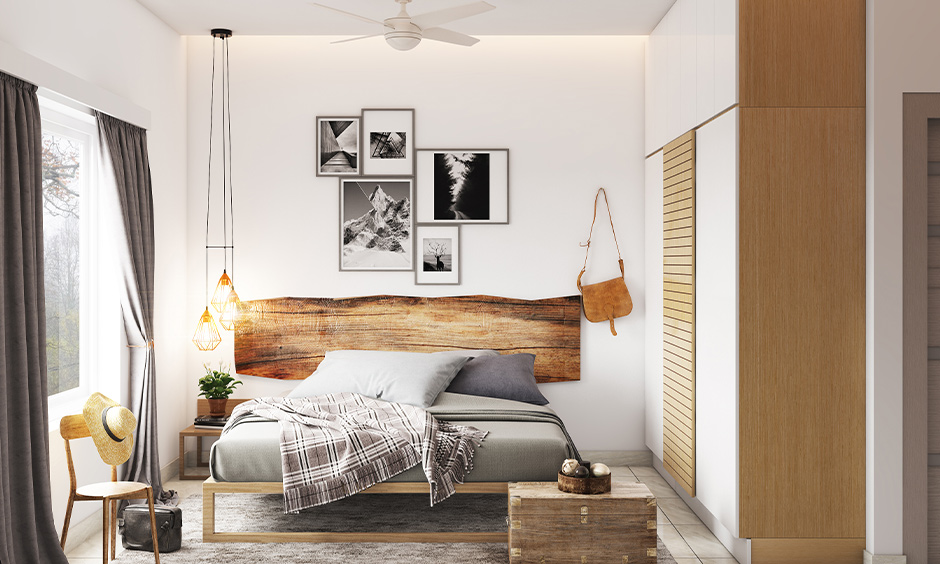 Bed with a unique wooden headboard design in the white bedroom brings a farmhouse vibe.