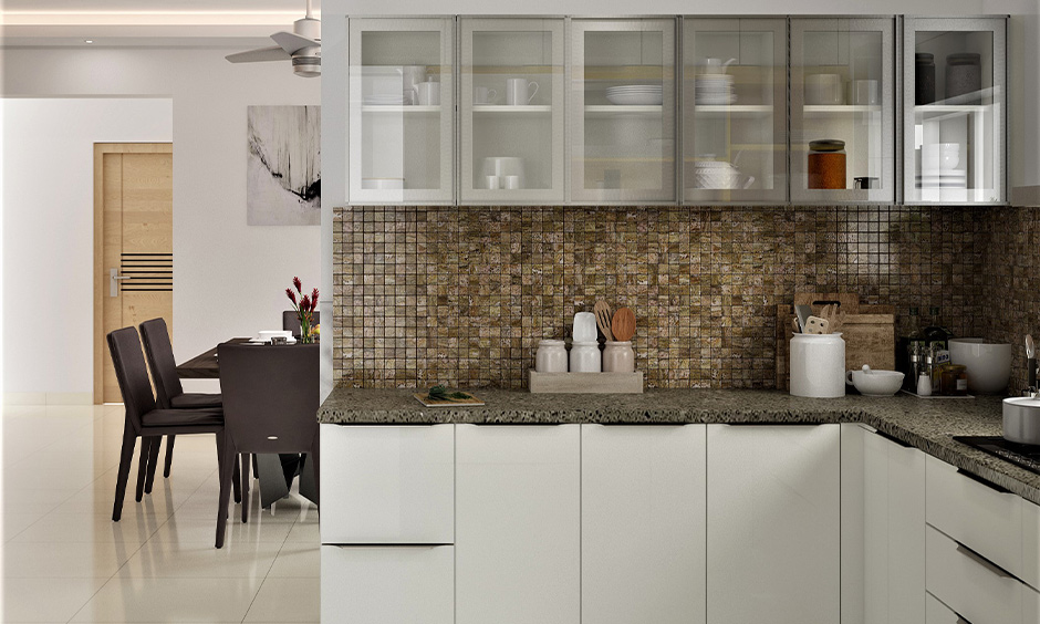 U-shaped kitchen wall-mounted crockery units with glass doors are the sleek kitchen crockery cabinet design for kitchen.