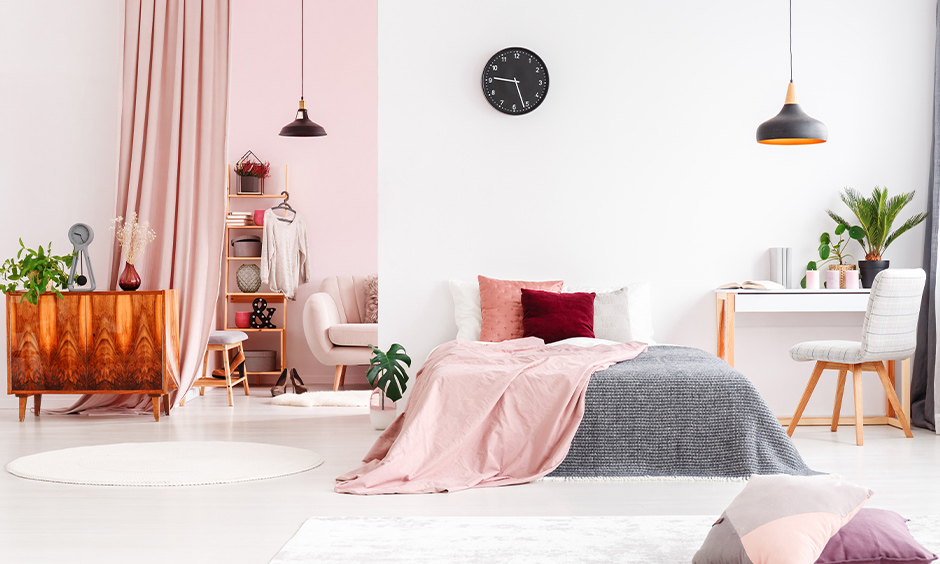 The white color combination for the pink wall will add an element of elegance and luxury to the bedroom.