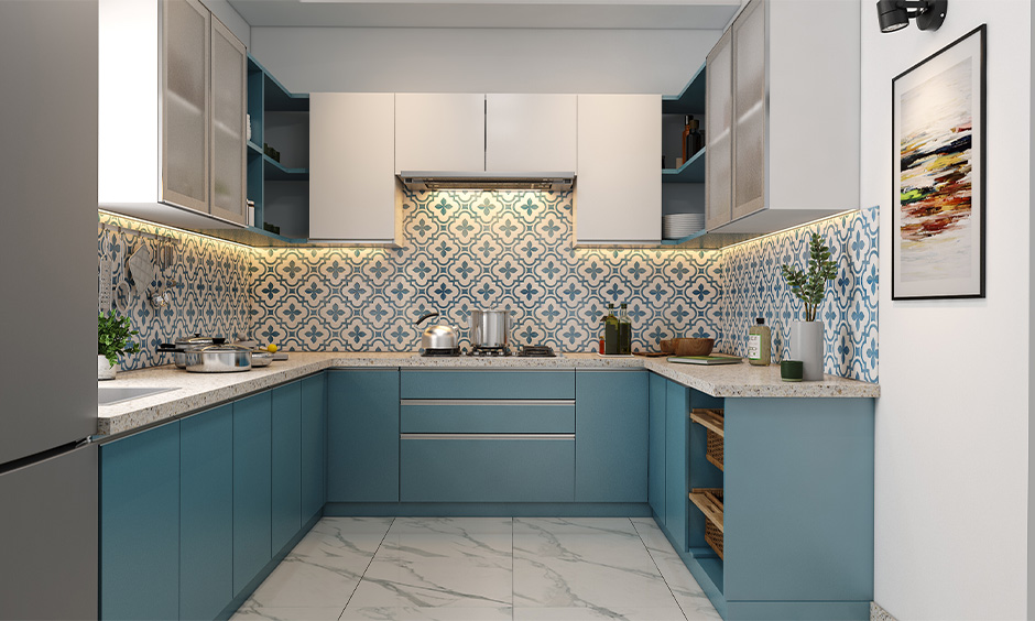 2021 kitchen cabinet colour trend with wooden laminate in teal and white combination lends the soothing vibe.