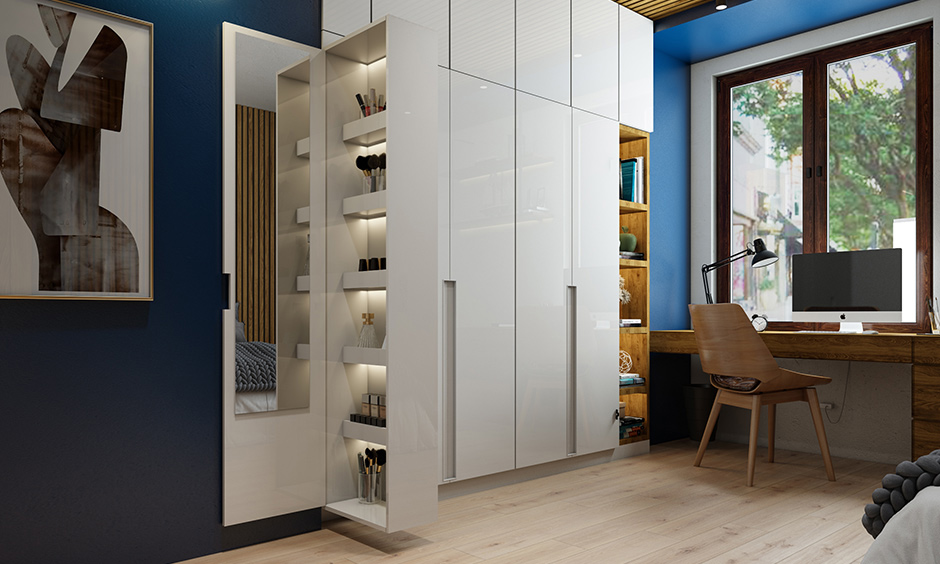 A wardrobe with a hidden dressing table in a minimal design is the best interior gift for a busy mom.