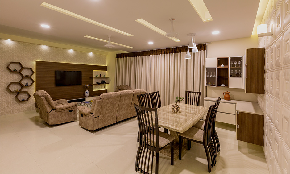 Beige cool summer colour in living cum dining area adds a sophisticated appeal and creates calm ambience.