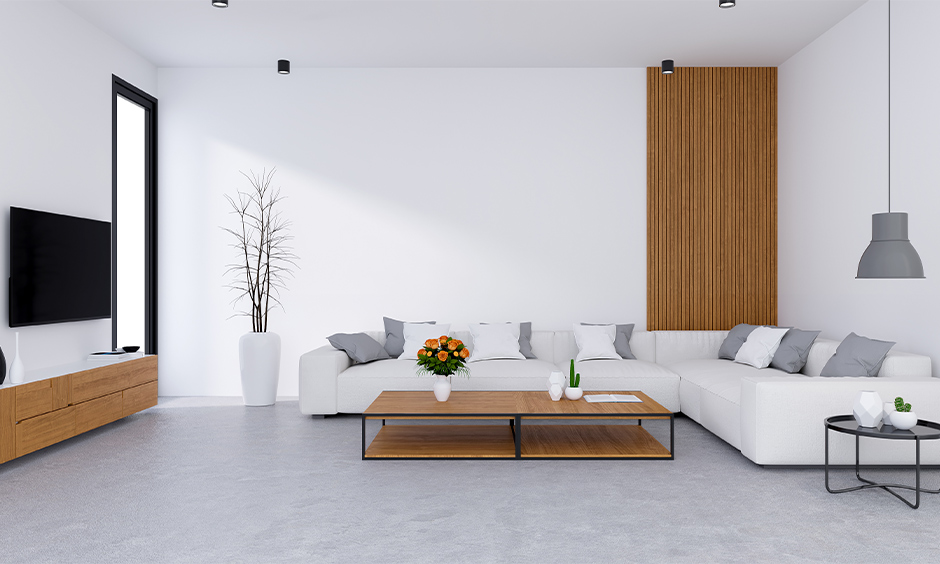 A black small corner table for white living room looks sophisticated and elegant.