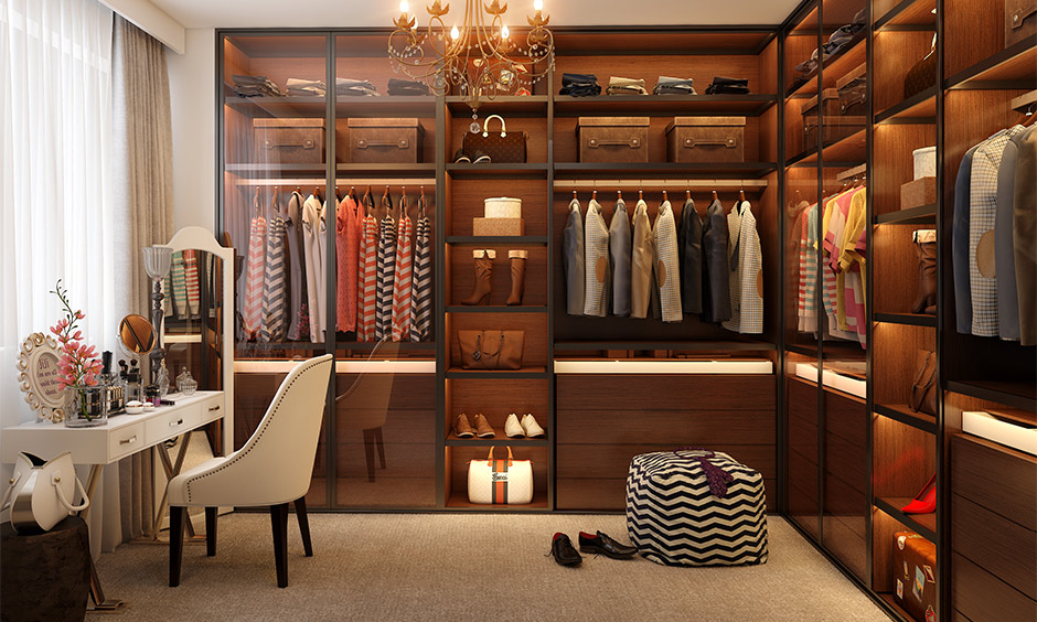 The walk-in wardrobe with a dedicated shoe rack cupboard with a backlight is the best space-saving shoe rack idea.