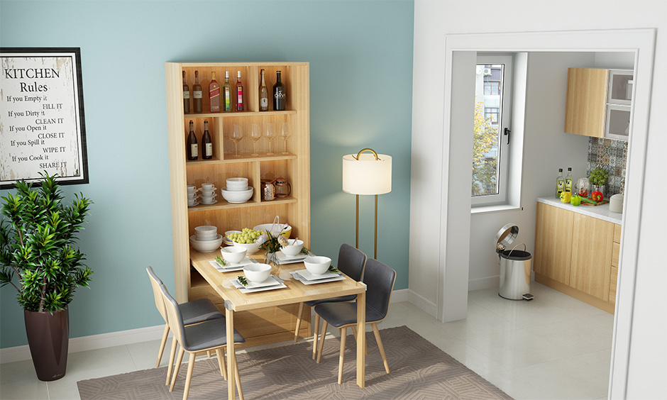 The kitchen cum dining area with wall mounted foldable dining table is the best home interior gift for mom for mother's day.