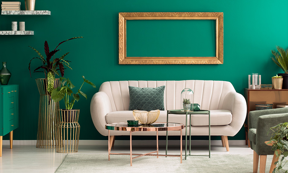 Living room cool summer colour in emerald green brings in a fresh and harmonious ambience with classic furniture.