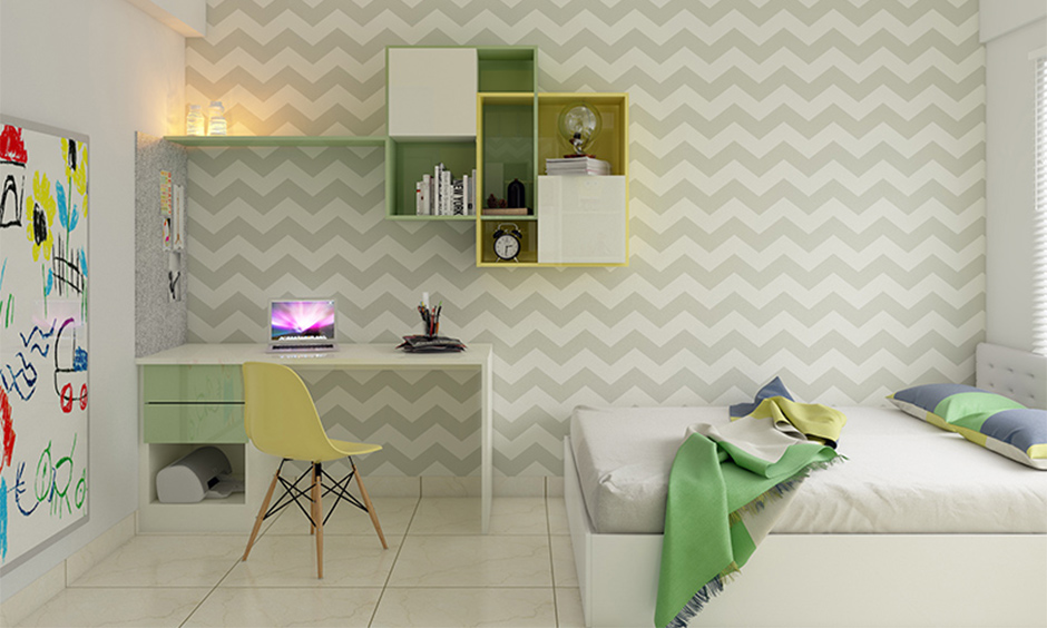 Study room decoration with zig-zag wallpaper and floating open shelf in green and white adds a sleek look.