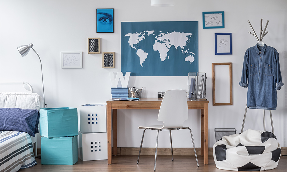 Study room decoration ideas in a room with a bean bag, painting frames and a bold world map lend a millennial-style vibe.