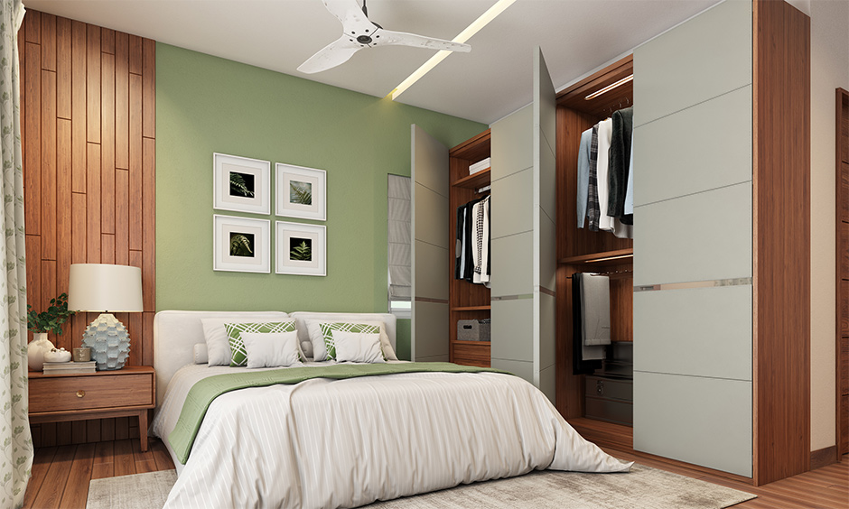 Small bedroom interior mistakes using wardrobe with hinged doors when less space between bed and wardrobe.