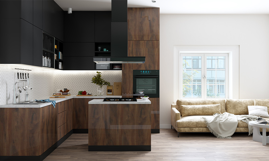 Island Indian open kitchen design in matt finish that looks spacious and airy.