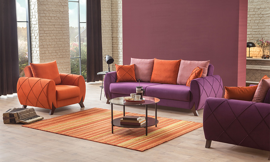 The latest trending sofa set design in a unique shape with intricate detailing in the living room lends a vibrant feel.