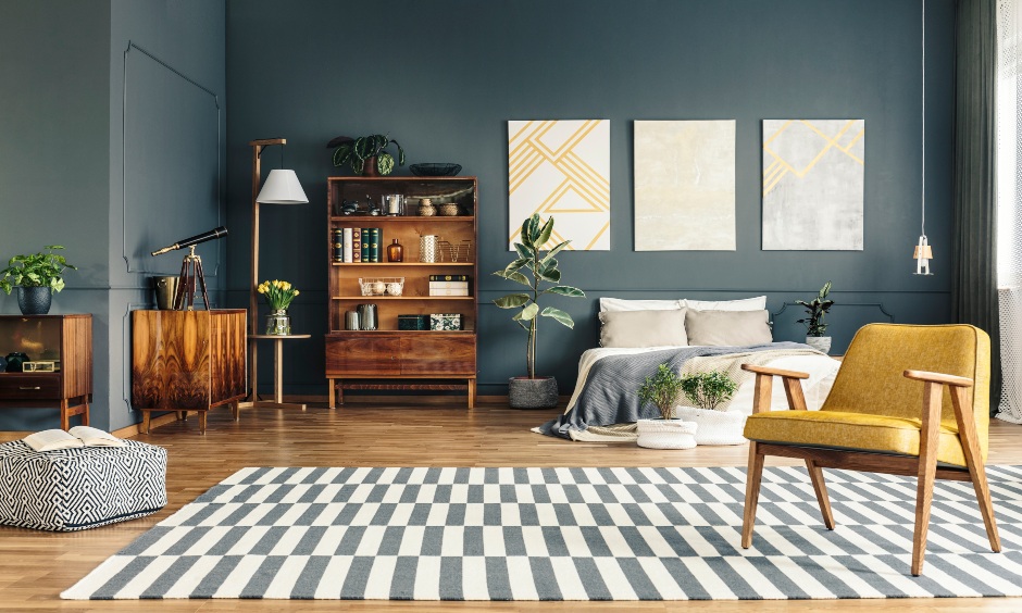 A contemporary bedroom with wooden flooring in two textures looks chic and is the light wood floor bedroom.