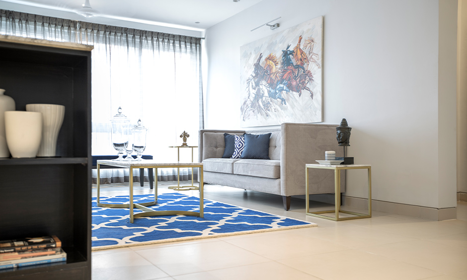 A marble top corner table for living room in minimal style lends a chic look