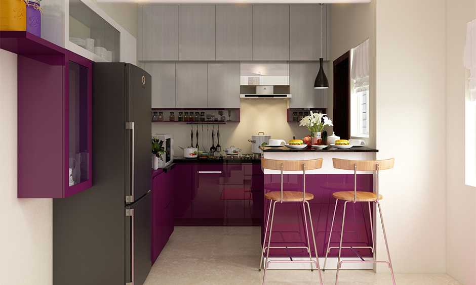 Maroon and grey combination of kitchen cabinet colour trend in 2021 lends a bold look.