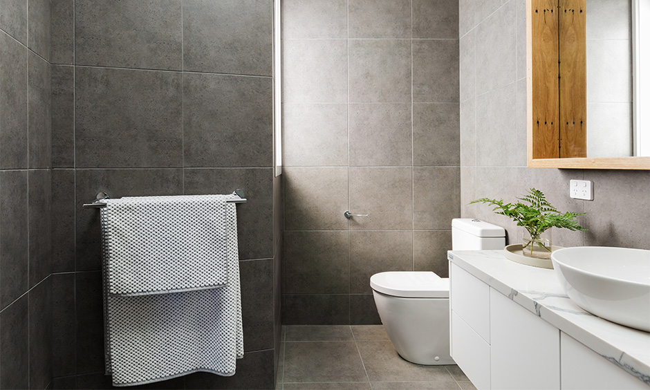 Modern bathroom tiles designed in a matte finish make the bathroom look spacious