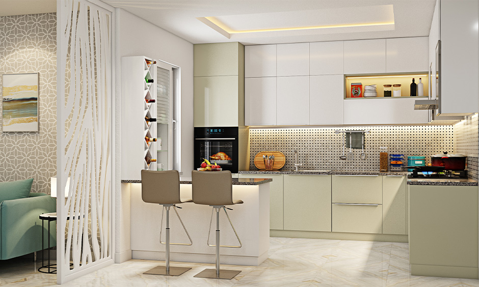 Modern open kitchen design in Indian style with vine rack and breakfast countertop