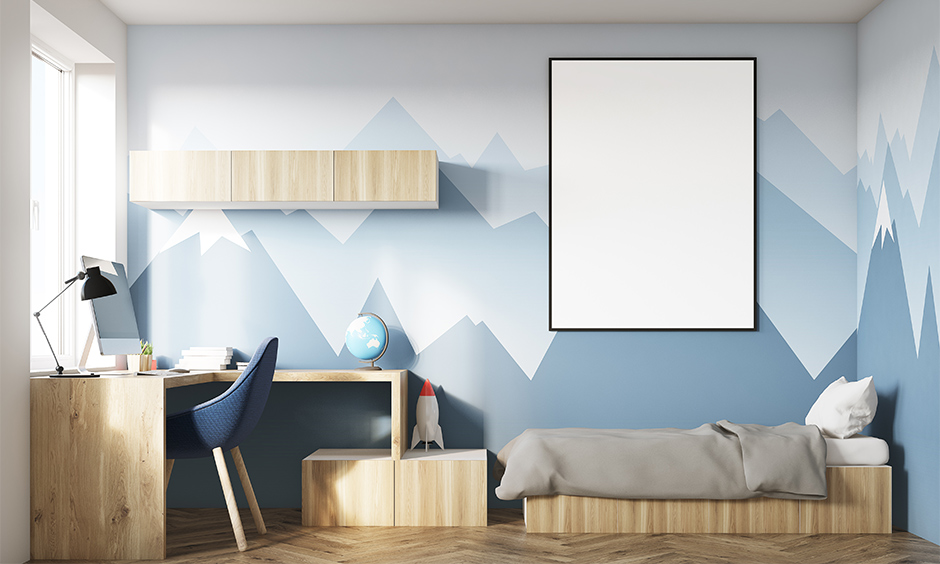 Kid's room wallpaper texture in the mountain-inspired landscape with multiple blue colours lends calmness to the place.