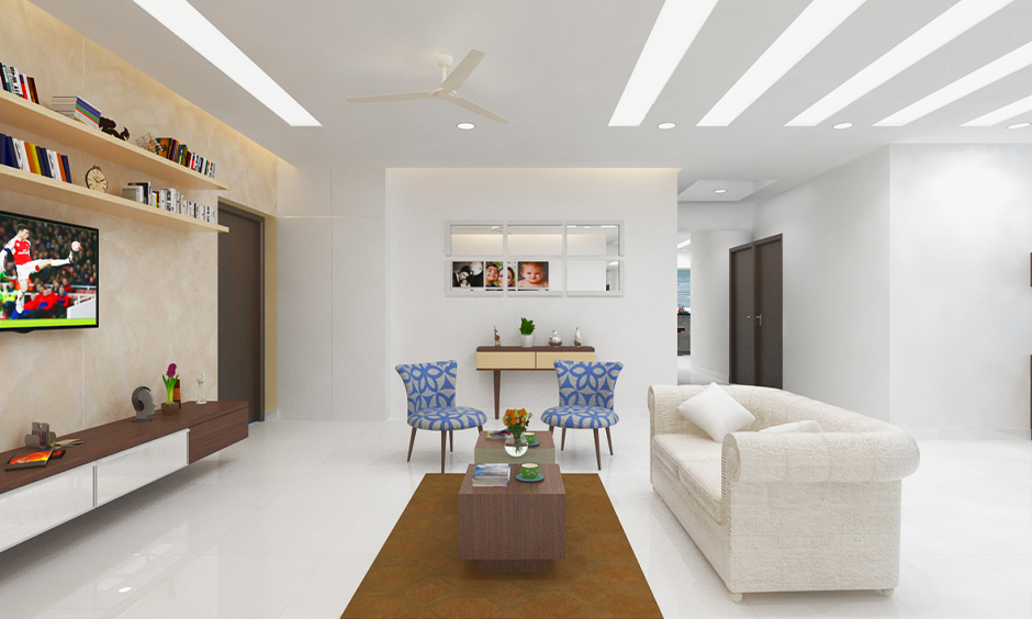 Porcelain white tiles for living room with glossy finish lends an elegant look to space.