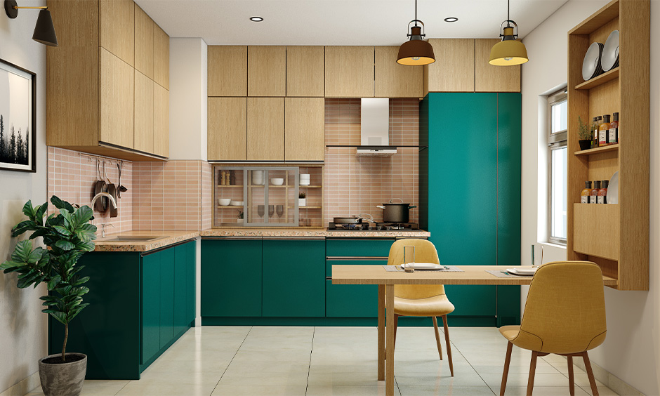 L-shaped kitchen cabinet colour trend in sea green and walnut combination creates a calm atmosphere with breakfast counter.