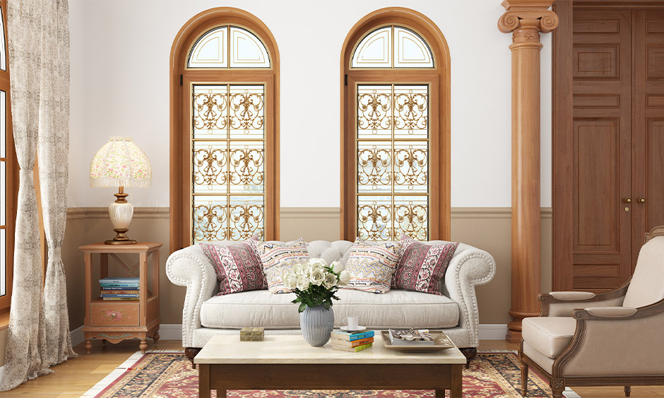 Simple modern window grill design in floral motifs pattern with traditional style in the living room.