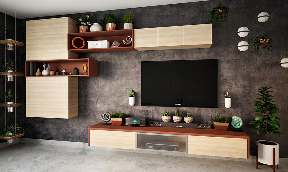 Small living room entertainment idea with floating tv unit and indoor plants brings nature vibe.