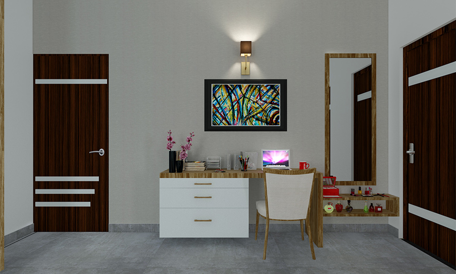 A wooden wall hanging dressing table design in polished texture in the bedroom looks elegant.