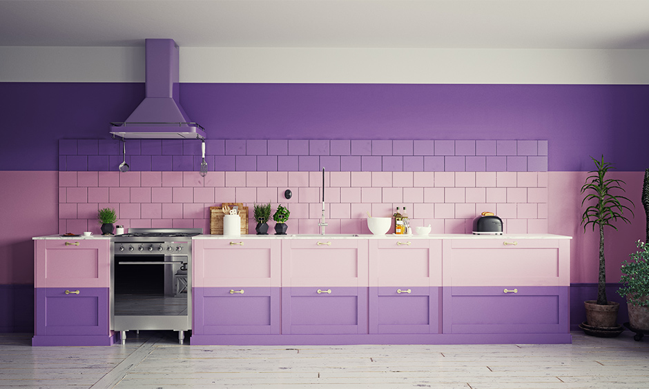 Single-wall kitchen in pink and purple colour combination for studio apartments is the best Indian kitchen interior.