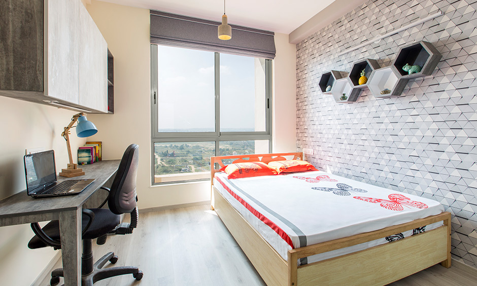 Guest room paint color in cream with a white ceiling and wooden flooring adds a natural charm to space.